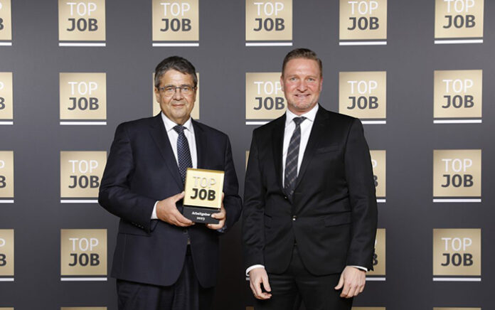 Former German vice-chancellor Sigmar Gabriel (L) is handing over the award to Marcus Mayer from Mayer & Cie. Photo - Mayer & Cie.