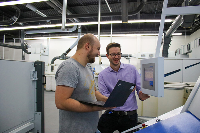 Tobias Hölters and Jan Herzog, former scholarship holders in electrical engineering with a focus on automation technology, have been part of the Trützschler family since completing their studies.