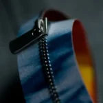 YKK develops concept EXCELLA zipper tape using nonwoven fabric partially derived from used clothing YKK