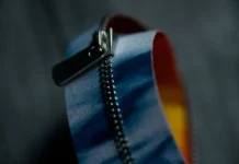 YKK develops concept EXCELLA zipper tape using nonwoven fabric partially derived from used clothing YKK