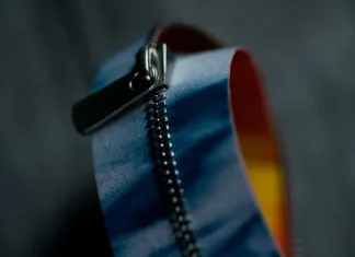 YKK develops concept EXCELLA zipper tape using nonwoven fabric partially derived from used clothing YKK